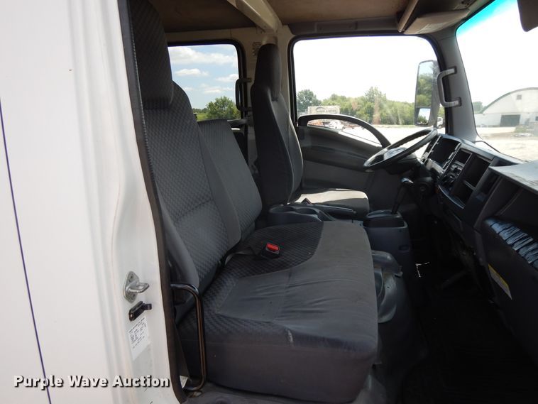 image for item DJ3474 2011 Isuzu NPR  flatbed truck