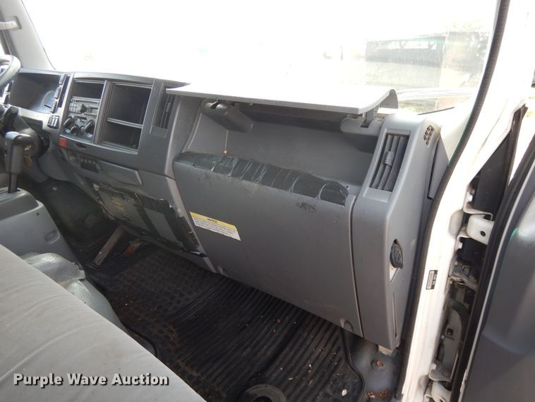 image for item DJ3474 2011 Isuzu NPR  flatbed truck