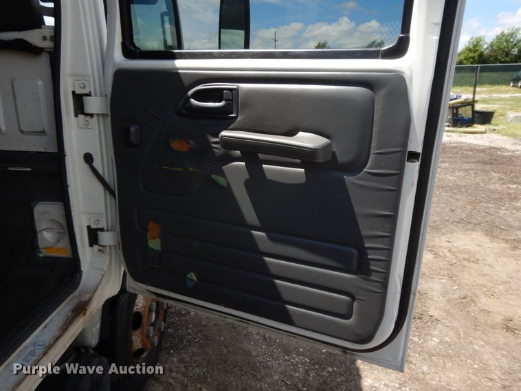 image for item DJ3474 2011 Isuzu NPR  flatbed truck