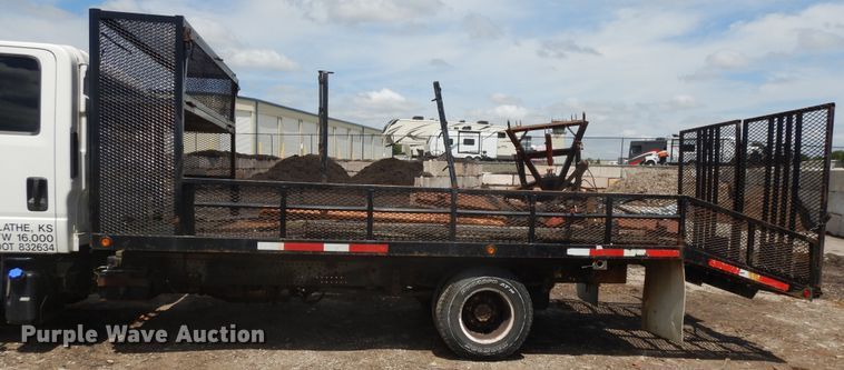 image for item DJ3474 2011 Isuzu NPR  flatbed truck