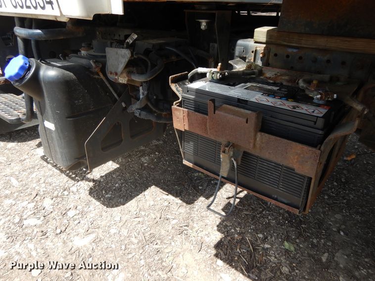 image for item DJ3474 2011 Isuzu NPR  flatbed truck