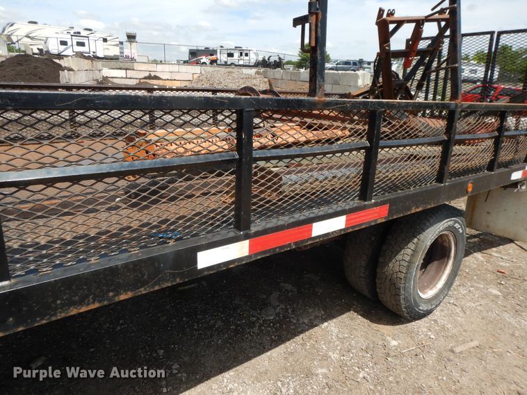 image for item DJ3474 2011 Isuzu NPR  flatbed truck