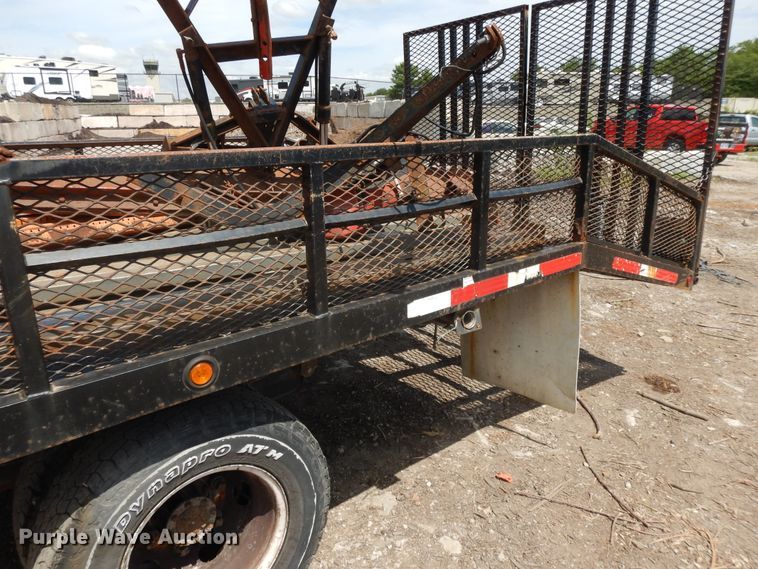 image for item DJ3474 2011 Isuzu NPR  flatbed truck