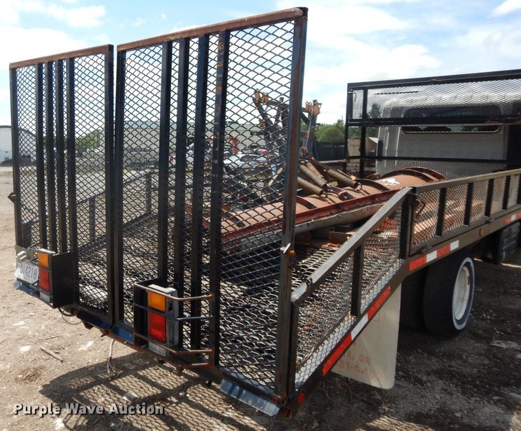 image for item DJ3474 2011 Isuzu NPR  flatbed truck