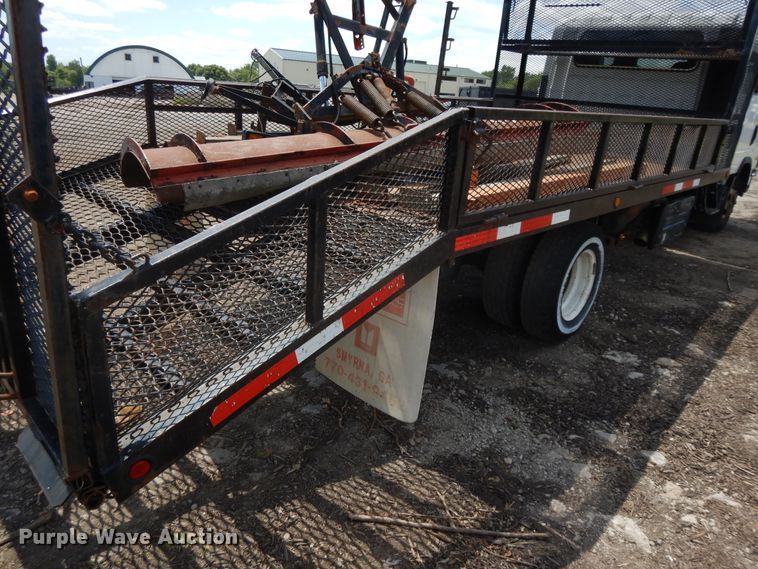 image for item DJ3474 2011 Isuzu NPR  flatbed truck