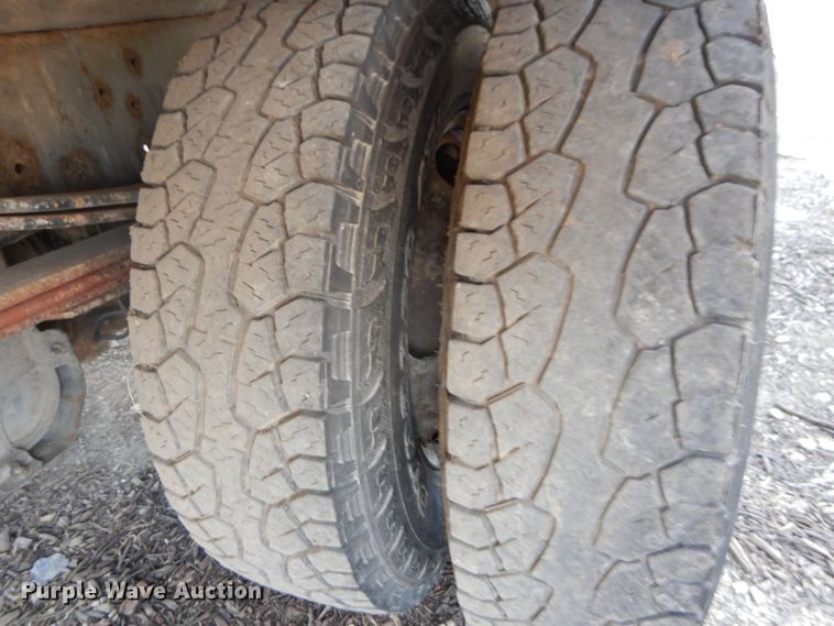 image for item DJ3474 2011 Isuzu NPR  flatbed truck