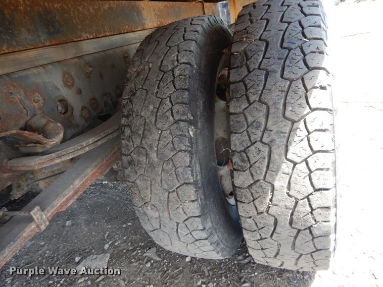 image for item DJ3474 2011 Isuzu NPR  flatbed truck