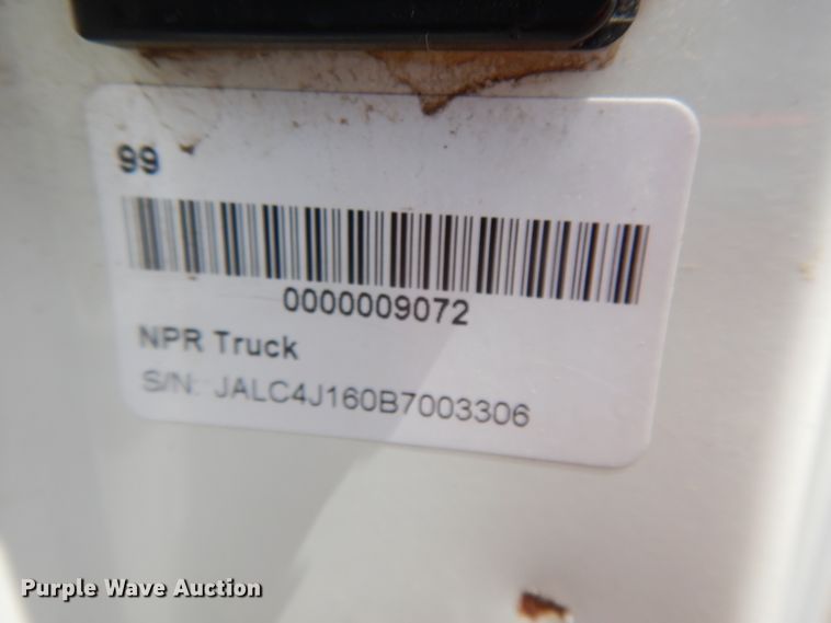 image for item DJ3474 2011 Isuzu NPR  flatbed truck