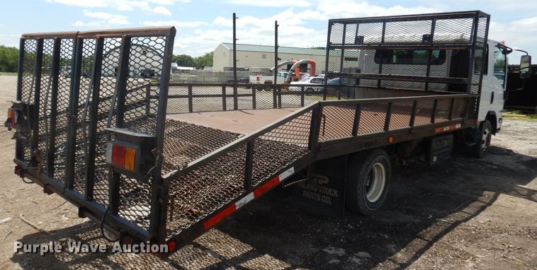 image for item DJ3476 2011 Isuzu NPR  flatbed truck