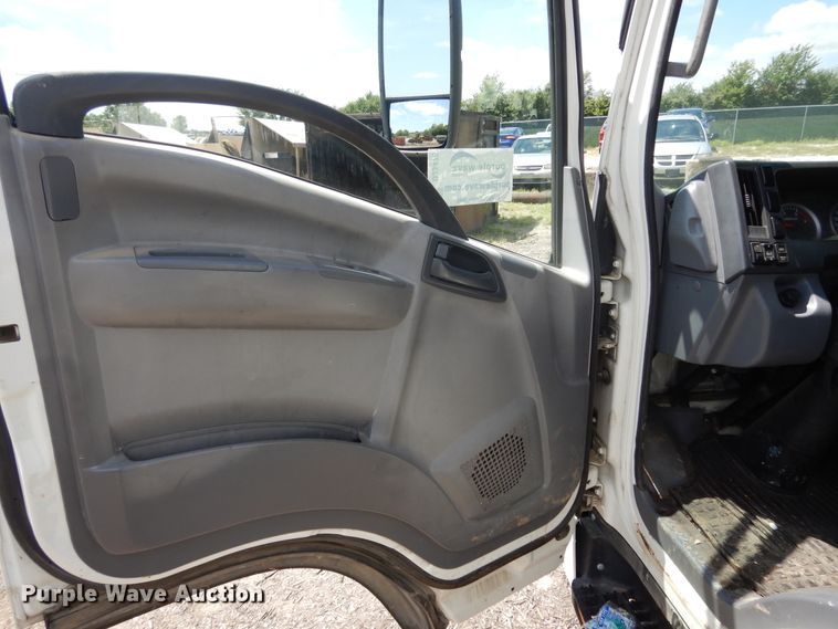 image for item DJ3476 2011 Isuzu NPR  flatbed truck