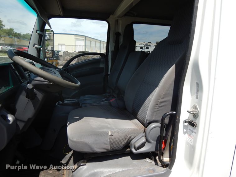 image for item DJ3476 2011 Isuzu NPR  flatbed truck