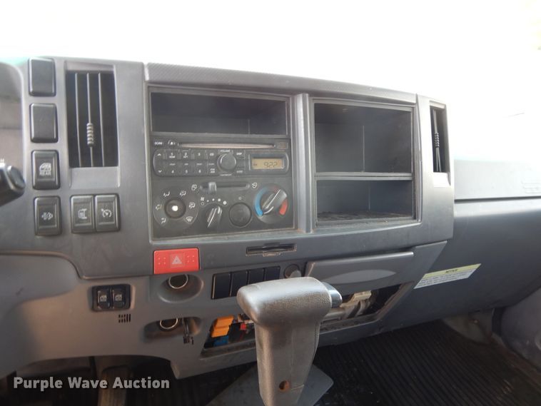 image for item DJ3476 2011 Isuzu NPR  flatbed truck