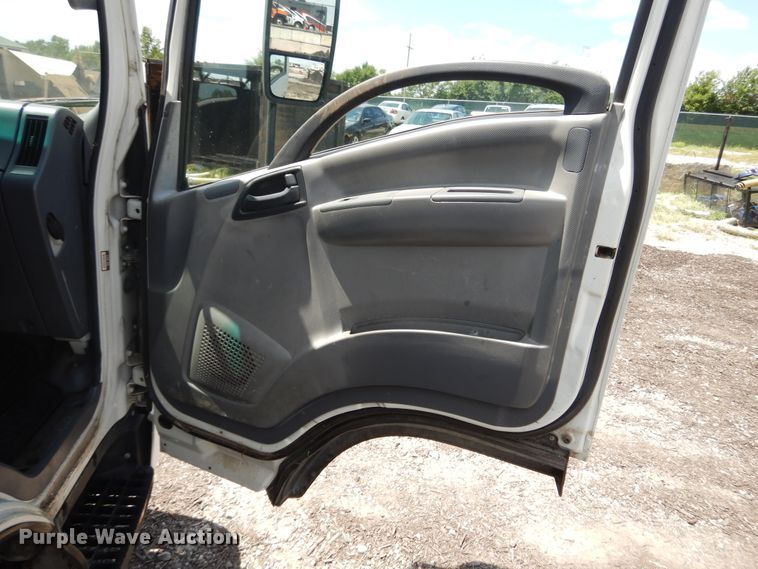 image for item DJ3476 2011 Isuzu NPR  flatbed truck