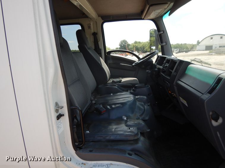 image for item DJ3476 2011 Isuzu NPR  flatbed truck