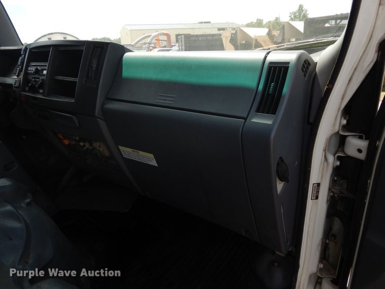 image for item DJ3476 2011 Isuzu NPR  flatbed truck