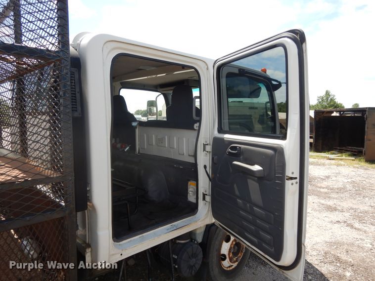 image for item DJ3476 2011 Isuzu NPR  flatbed truck