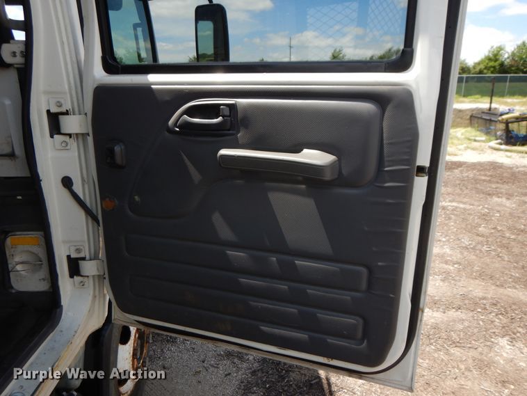 image for item DJ3476 2011 Isuzu NPR  flatbed truck