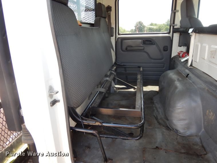 image for item DJ3476 2011 Isuzu NPR  flatbed truck