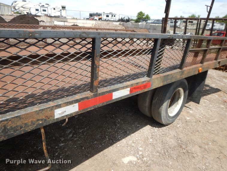 image for item DJ3476 2011 Isuzu NPR  flatbed truck