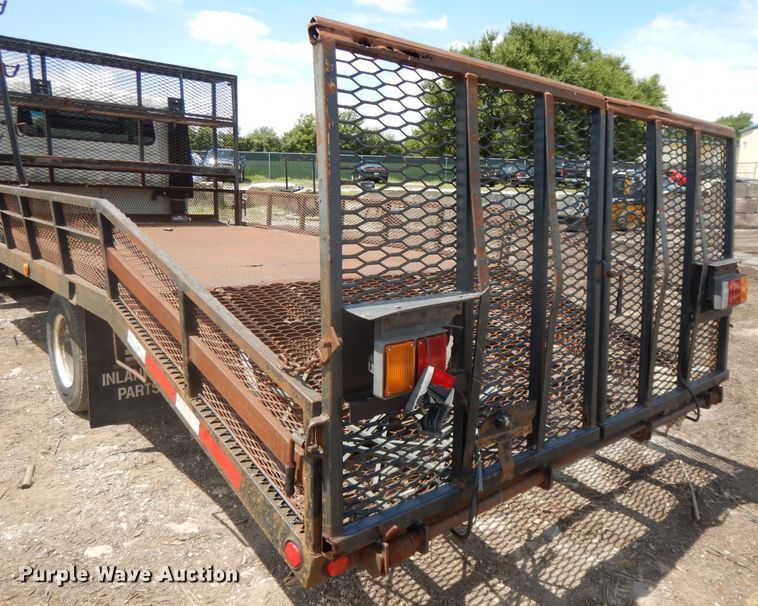 image for item DJ3476 2011 Isuzu NPR  flatbed truck