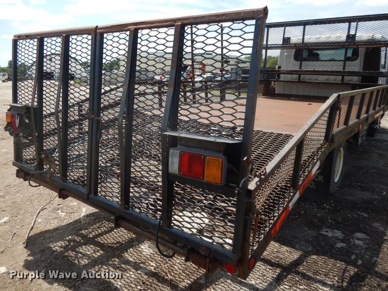 image for item DJ3476 2011 Isuzu NPR  flatbed truck