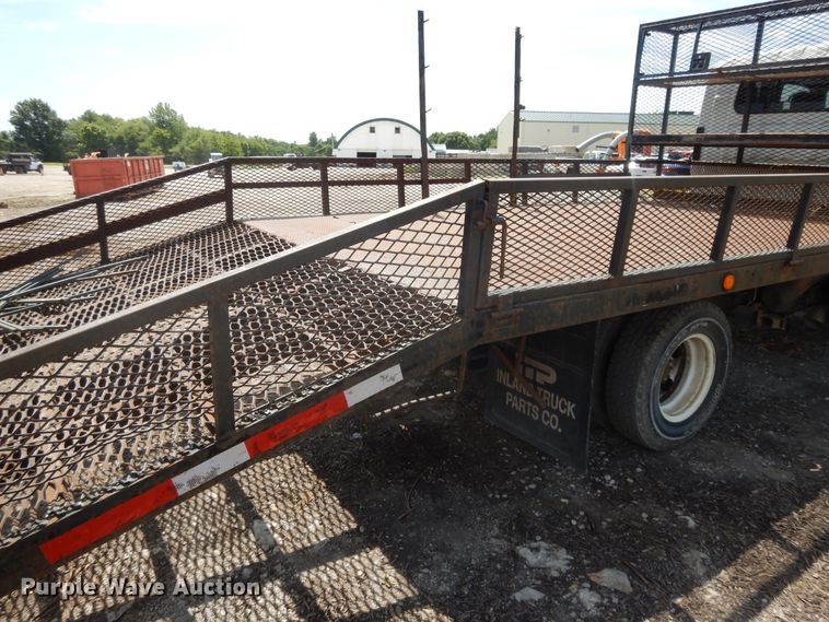 image for item DJ3476 2011 Isuzu NPR  flatbed truck