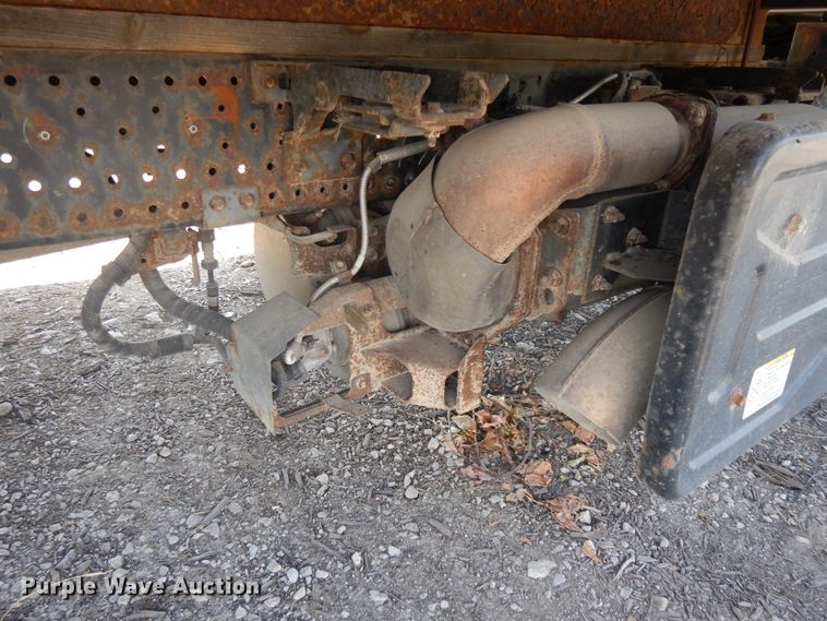 image for item DJ3476 2011 Isuzu NPR  flatbed truck