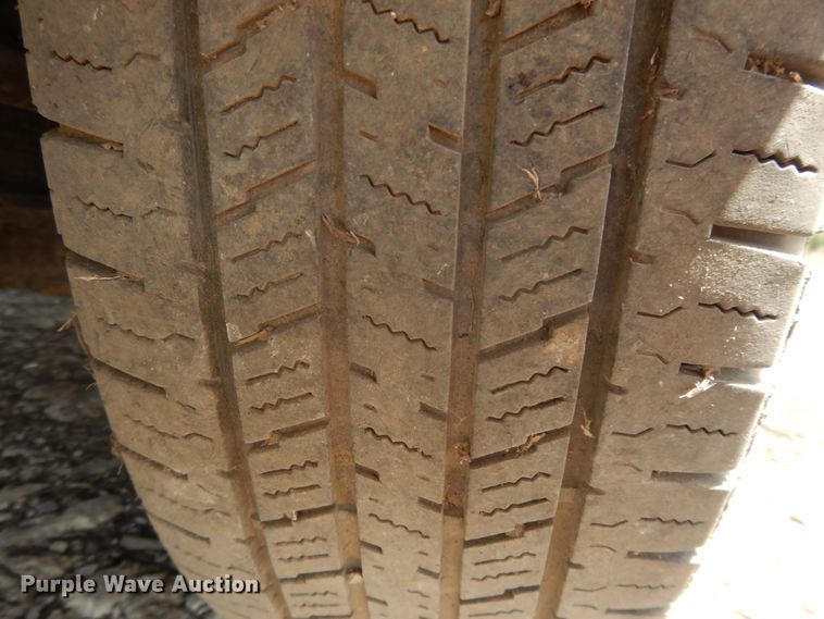 image for item DJ3476 2011 Isuzu NPR  flatbed truck