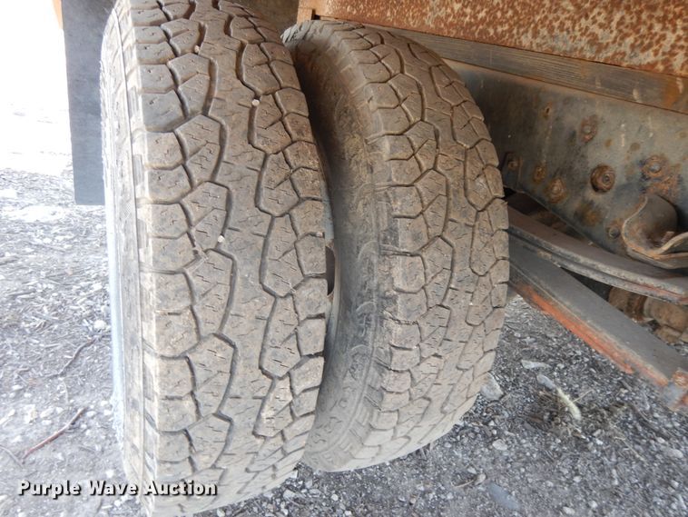 image for item DJ3476 2011 Isuzu NPR  flatbed truck