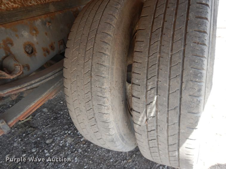 image for item DJ3476 2011 Isuzu NPR  flatbed truck