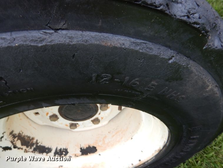 image for item HB9345 2004 New Holland TC55DA  MFWD tractor