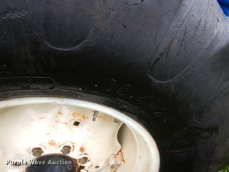 image for item HB9345 2004 New Holland TC55DA  MFWD tractor