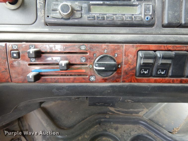 image for item DH6569 2001 Volvo VNM42T  dump truck