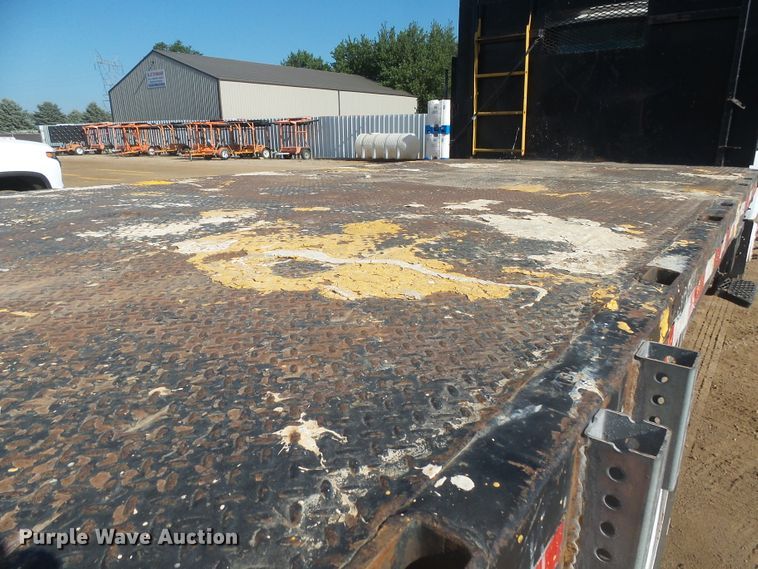 image for item DX9231 2003 GMC 6500  flatbed truck