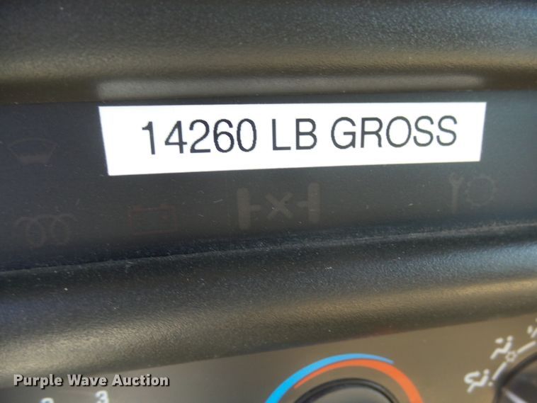 image for item DX9231 2003 GMC 6500  flatbed truck