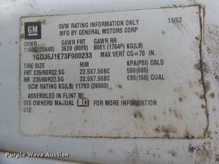 image for item DX9231 2003 GMC 6500  flatbed truck