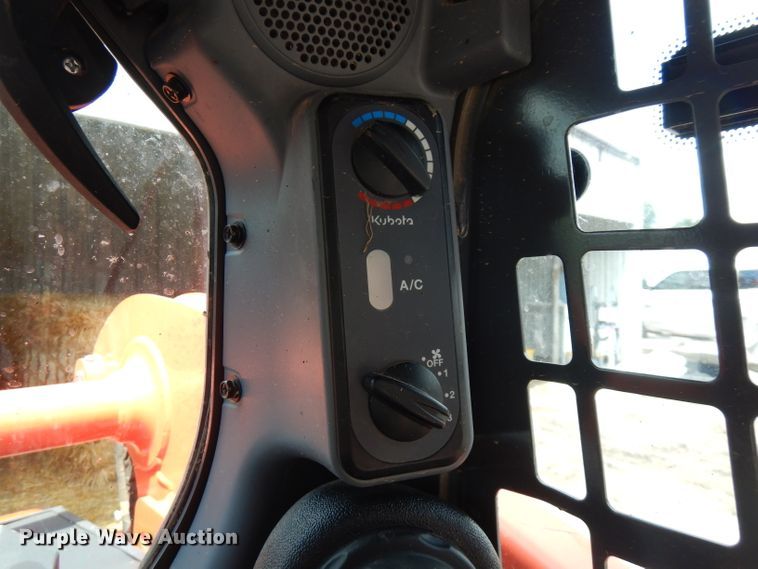 image for item FN9326 2015 Kubota SSV65  skid steer loader