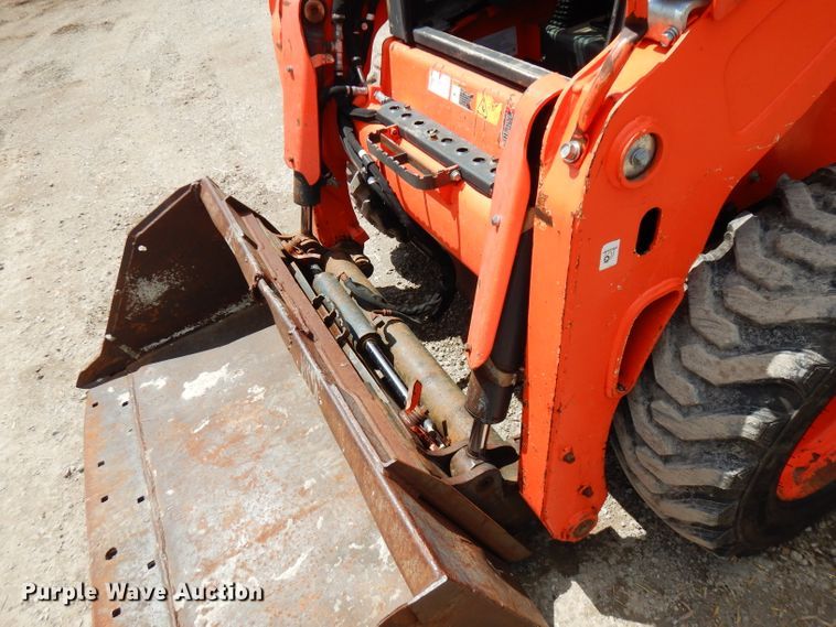 image for item FN9326 2015 Kubota SSV65  skid steer loader