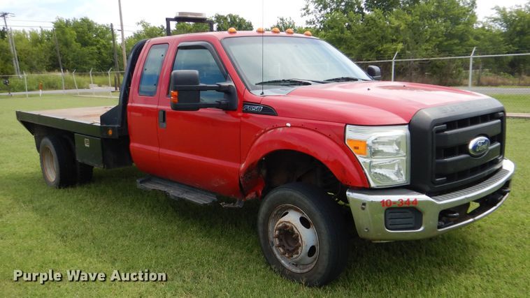 image for item DI0306 2012 Ford F550 Super Duty SuperCab flatbed truck