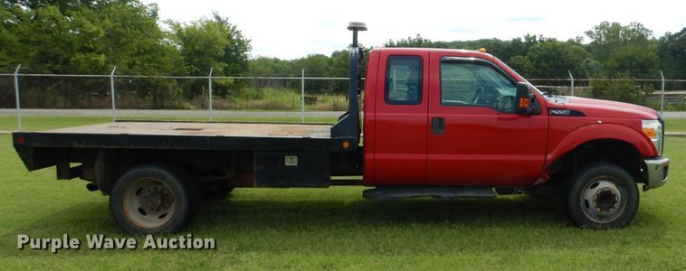 image for item DI0306 2012 Ford F550 Super Duty SuperCab flatbed truck