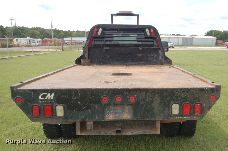 image for item DI0306 2012 Ford F550 Super Duty SuperCab flatbed truck