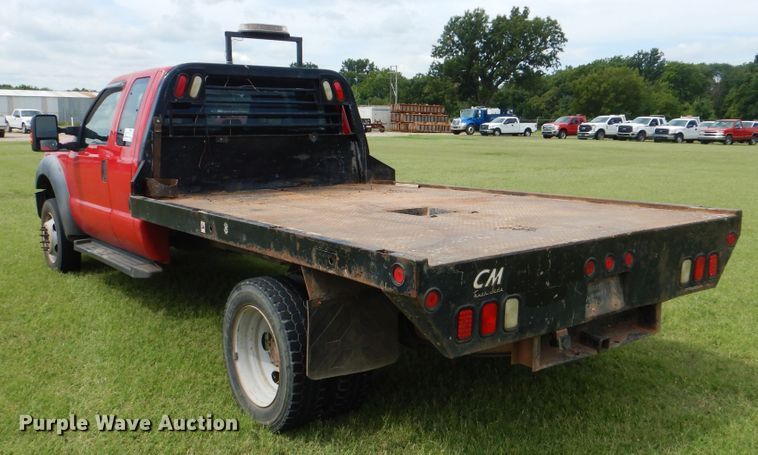 image for item DI0306 2012 Ford F550 Super Duty SuperCab flatbed truck