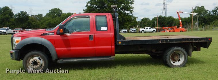 image for item DI0306 2012 Ford F550 Super Duty SuperCab flatbed truck