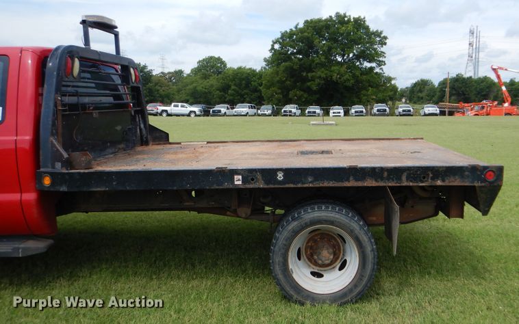 image for item DI0306 2012 Ford F550 Super Duty SuperCab flatbed truck