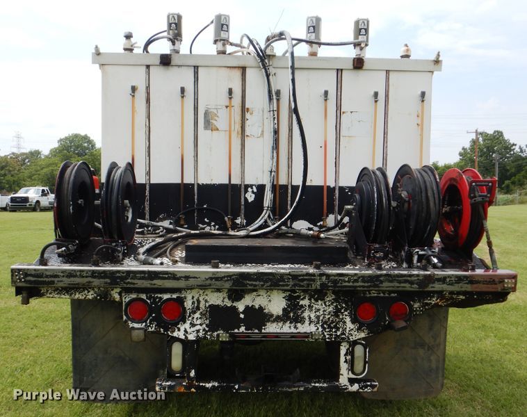 image for item HJ9894 2006 Ford F750 Super Duty  flatbed truck