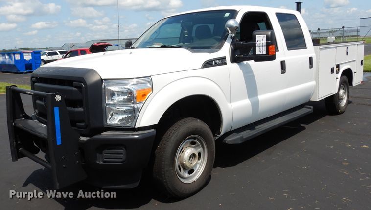 image for item DJ4375 2015 Ford F250 Super Duty XL  Crew Cab utility bed pickup truck