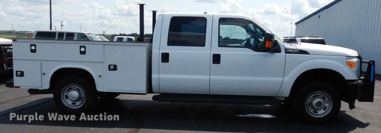 image for item DJ4375 2015 Ford F250 Super Duty XL  Crew Cab utility bed pickup truck
