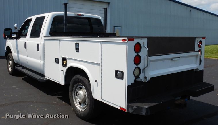 image for item DJ4375 2015 Ford F250 Super Duty XL  Crew Cab utility bed pickup truck