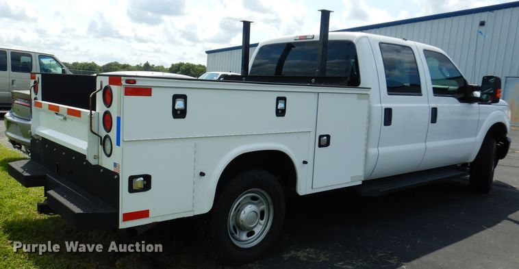 image for item DJ4376 2015 Ford F250 Super Duty XL  Crew Cab utility bed pickup truck