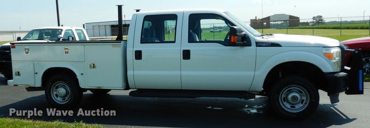 image for item DJ4381 2014 Ford F250 Super Duty XL  Crew Cab utility bed pickup truck